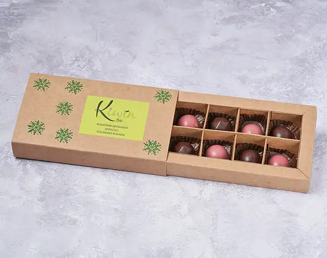 Bombones kiwiberry chocolate negro y ruby y mini kiwi. Detalles personalizados originales. Kiwin de Finca Terramor Asturias. Venta de productos ecológicos y mermeladas artesanales.